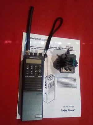 Radio Shack 2 metri HTX-202 Handi-Talkie (FUNZIONANTE) - Immagine 1 di 4