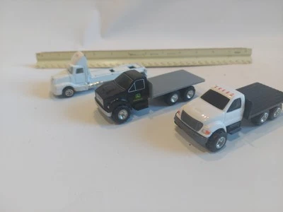 Camiones de plataforma plana diecast Ertl John Deere y Hot Wheels semi Foto 1 de 4