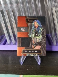 2022 Panini Select WWE Selective Swatches Sasha Banks #SW-SBK Smackdown - Picture 1 of 2