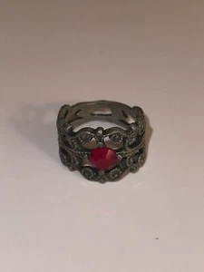 BRONZE TONE BIG STATEMENT RING WITH RED STONE AND FLEUR DE LIS TYPE DESIGNS SZ 7 - Picture 1 of 2