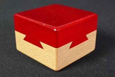 Rompecabezas Caja Imposible Madera Cola de Milano Rompecabezas Magic Joyero Tapa Roja Foto 1 de 4