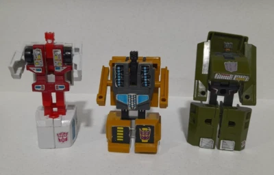 bundle lot 3 Vintage G1 Transformers BRAWL Tank FIRST AID Ambulance SWINDLE Jeep - Image 1 of 4