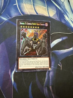 Yugioh! Number 15: Gimmick Puppet Giant Grinder NUMH-EN027 Secret Rare Unlim NM - Image 1 of 2