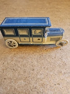 TIN PENNY TOY CAR ABOUT 4 1/2 INCHES LONG - Picture 1 of 22