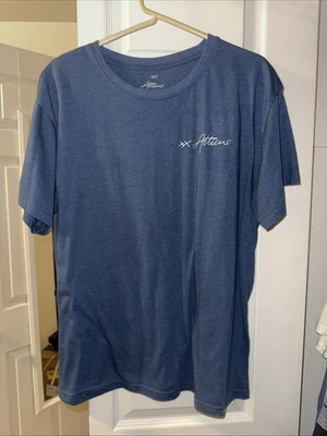 Camisa Atticus XXL Ella Conquistó Sus Demonios y Llevó Su Camiseta Scare Like Wings Foto 1 de 3