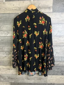 Abito tunica Free People taglia XS nero floreale tate maniche svasate boho cravatta schiena - Foto 1 di 12
