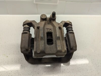 Pinza de freno trasera izquierda Nissan Frontier/XTerra/Pathfinder 2006 fabricante de equipos originales Foto 1 de 4