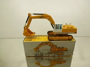 NZG 273 DEMAG H55 HYDRAULIC EXCAVATOR BAGGER -RARE-YELLOW 1:50- GOOD IN BOX - Imagen 1 de 8