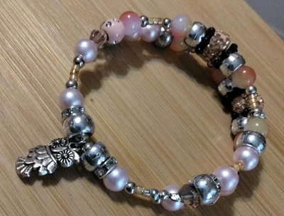 Handmade 11in Wrap Bracelet-Glass, Plastic, Rhinestone-Silvertone Owl Charm. - Image 1 of 4