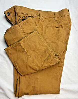 Pantalones de mezclilla de lona Carhartt para hombre 34x34 marrón camel calce relajado resistentes flexibles Foto 1 de 4