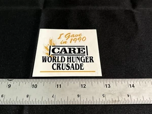 CARE 1990 Welthunger Kreuzzug Aufkleber - Bild 1 von 1