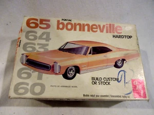 Kit Modelo Tapa Dura AMT 65 Bonneville Caja Original/Completo/Sin Construir/Inst & Calcomanías - Imagen 1 de 3