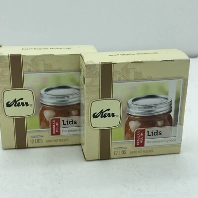 24 tapas de tarro de enlatado boca regular Kerr® Sure Tight™ tapas solo sin bandas 2 docenas Foto 1 de 4