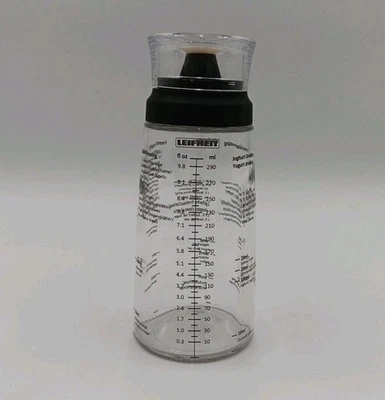 Coctelera de vidrio para aderezo para ensaladas Leifheit con recetas negra Foto 1 de 4