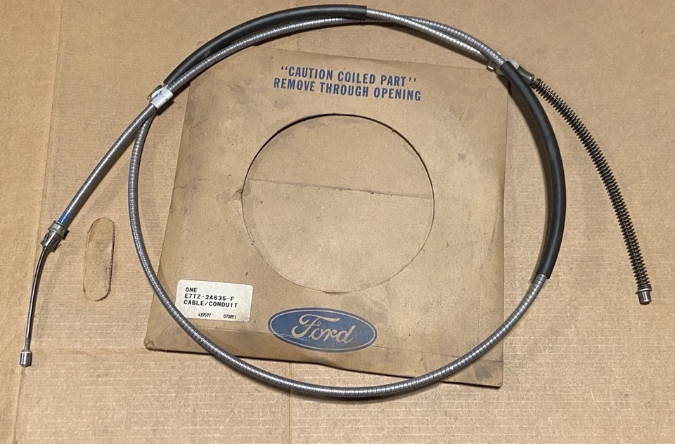 Cable de freno de estacionamiento trasero derecho Ford E7TZ-2A635-F -- 1980-1989 F250 F350 -- NUEVO DE STOCK Foto 1 de 4