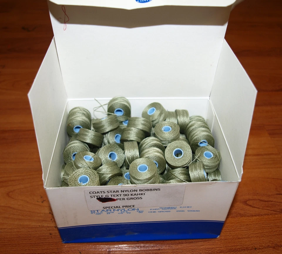 Coats Prewound Bobbins nylon 1 box of 144 pcs style G size 92 color kahki - Image 1 of 1