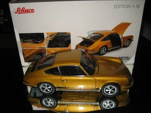 1:18 Schuco Porsche 911 S 1973 cupé dorado Rareza en EMBALAJE ORIGINAL - Imagen 1 de 5