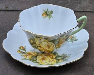 Shelley Teacup & Saucer With Yellow Flowers Roses Green Handle Fluted