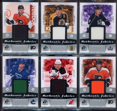 2010-11 SP Game Used Authentic Fabrics  6 Jersey Card Lot - Image 1 of 2