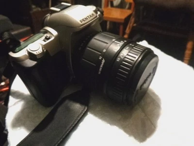 A Pentax MZ-50 35mm Film Camera W/435-80mm F4 5-6 Lens W/ A Optex Case - Image 1 of 2