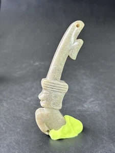 A Carved jade figure 玉人形佩 - Picture 1 of 14