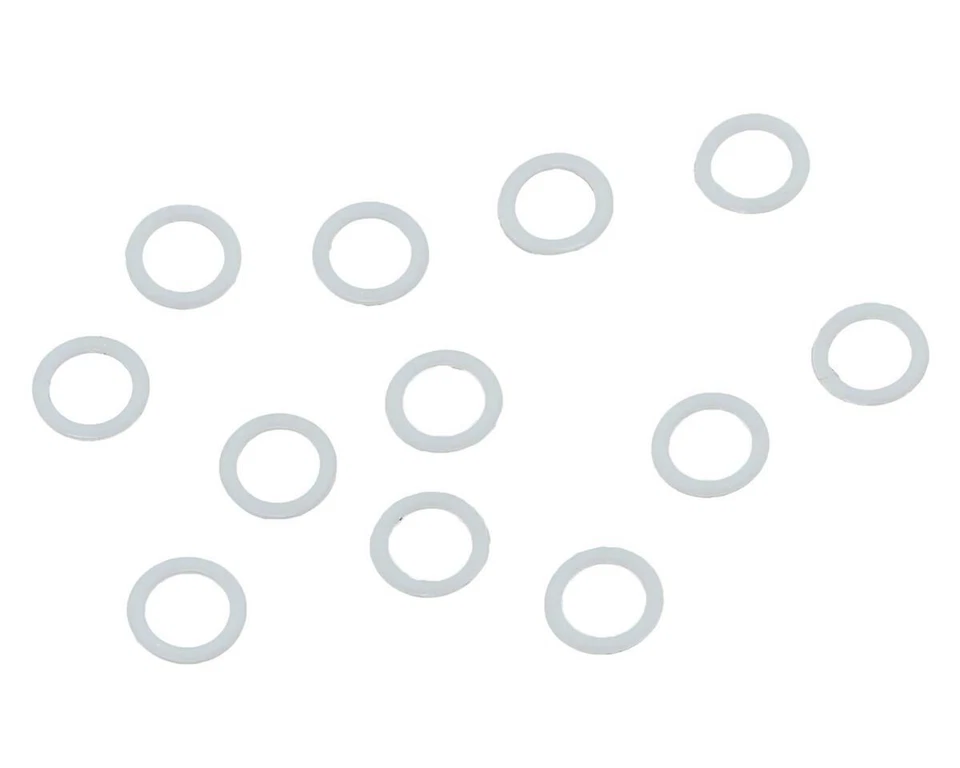 Espaciadores de motor de teflón Fantom .010 (12) [FAN53609] Foto 1 de 2