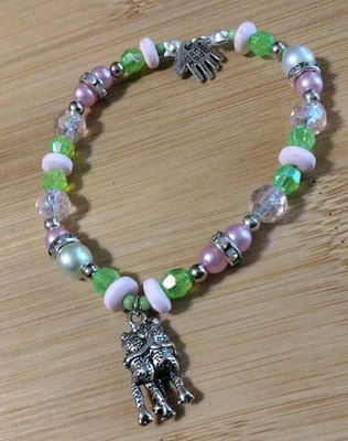Handmade Elastic Bracelet-6.75 in-Glass and Plastic-1 Metal Alloy Frog Charm. - Image 1 of 4
