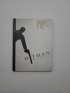Hitman HD Trilogy with Artbook - Xbox 360 - Acceptable Condition - Picture 1 of 6