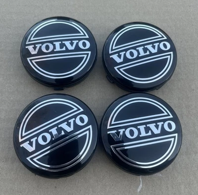 JUEGO DE 4 TAPACUBOS VOLVO NEGRO CENTRO CUBIERTA LOGO LLANTAS 3546923 Foto 1 de 4
