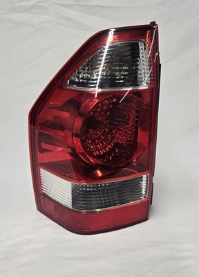 2001 - 2012 三菱蒙特罗发球杆尾灯 Assy LH — 第 1/4 张图片