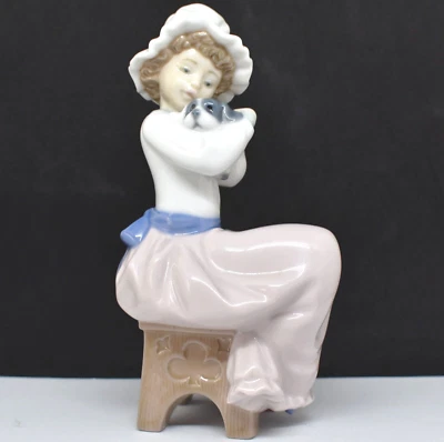 Nao by Lladro A Big Hug  # 1049G - Girl with Puppy Figurine - image 1 of 4