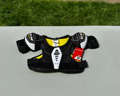 Almohadillas de hombro CCM Tacks para jóvenes talla mediana Foto 1 de 3