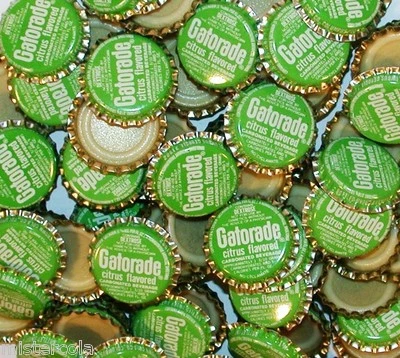 Lote de 25 tapas de botellas de refresco GATORADE CITRUS forradas de plástico nuevo stock antiguo Foto 1 de 2