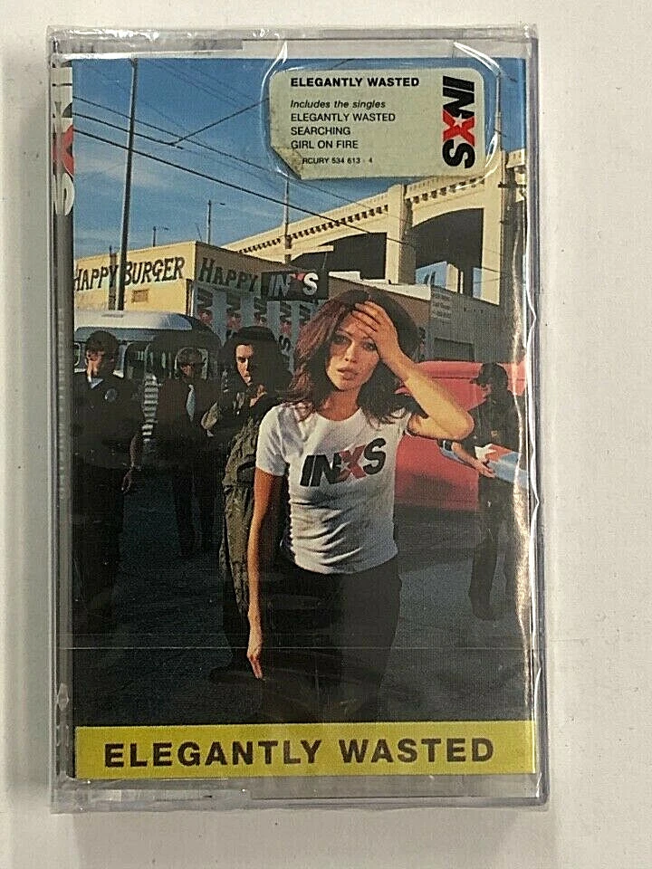INXS - ELEGANTLY WASTED - MC MUSICASSETTA NUOVA E SIGILLATA  - Immagine 1 di 3
