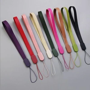 Cordino corto in pelle anti-perdita per cellulare in pelle PU porta stringhe per fotocamera - Foto 1 di 21