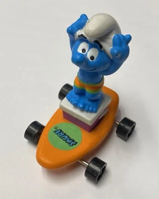 Pitufos Manos Arriba Pitufo Naranja Tabla de Surf Applausos Peyo Figura Promocional De Colección Hardee Foto 1 de 4