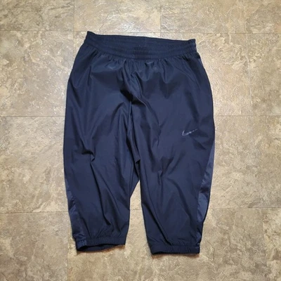 Pantalones de chándal Nike Flex tejidos capri grandes L negros para mujer correr senderismo al aire libre Foto 1 de 4