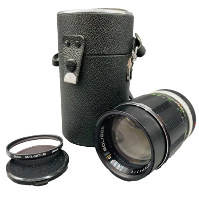 SOLIGOR AUTO LENS 1:2.8  f=135mm 55ø No.793712 with HOYA 55mm Skylight Filter - Image 1 of 4