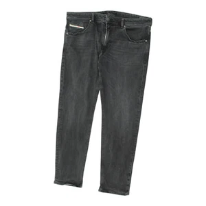 Jeans Cónicos Negros Diesel | Denim de Diseñador Informal de Lujo de Alta Gama De Colección para Hombres - Imagen 1 de 4
