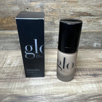 Glo Luminous Liquid Foundation SPF 18 Brulee. Foundation - Image 1 of 3