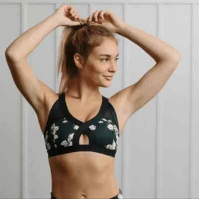 Sutiã esportivo Liza novo com etiquetas $58 movimento livre de pessoas buraco na fechadura preto laranja vários tamanhos M - Imagem 1 de 4