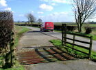 Photo 6x4 Swine Carrs Royal Mail post office van passing a disused cattle c2009