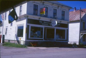 35mm slide New Cambridge Brunswick Canada Esso gas station pumps Donovan store - Picture 1 of 1