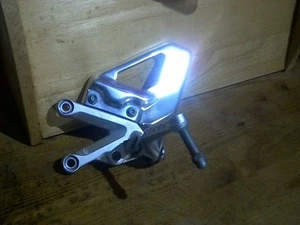 APRILIA RSV1000 MILLIE LEFT FRONT FOOT REST HANGER PEG 01/06 - Picture 1 of 3