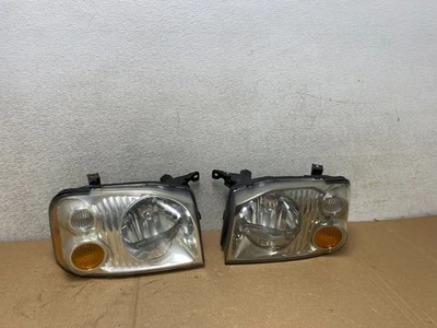 Faros halógenos izquierdo+derecho Nissan Frontier 2001 a 2004 OEM V1059 DW Foto 1 de 4