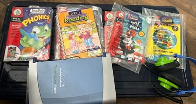 LeapPad Lot - 2 Quantum Pads, 1 Headphone 6  Books/ Cassettes - Image 1 of 4