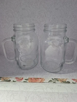 Juego de 2 tazas tarro de albañil de vidrio transparente en relieve mariposa DOLLY PARTON 24 OZ NUEVO Foto 1 de 3