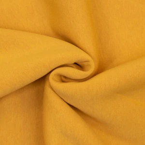 Felpa tessuto tinta unita giallo senape (prezzo=0,5 metri) - Foto 1 di 3