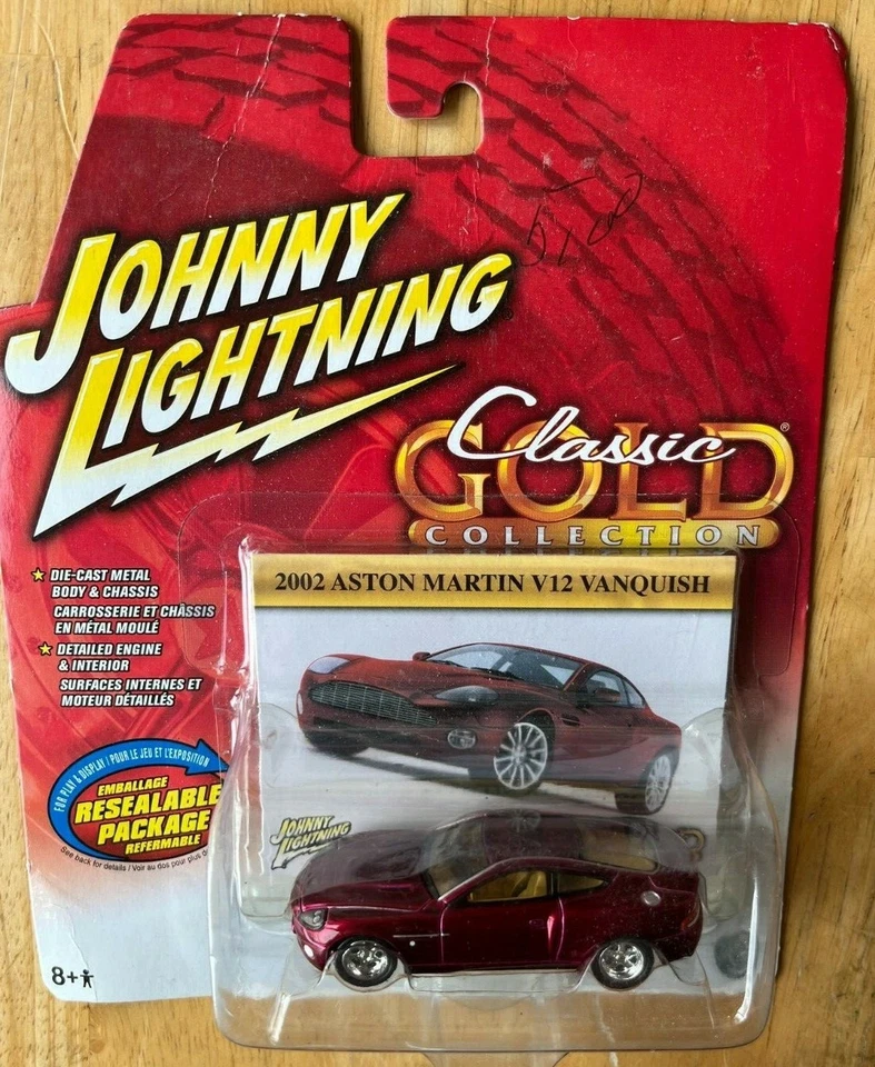 2002 Aston Martin V12 Vanquish Johnny Lightning Classic Gold Collection 1 64