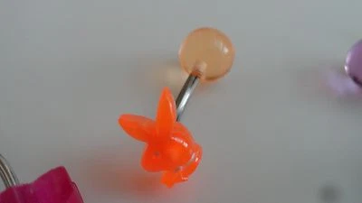 Piercing Anillo Ombligo Barra Banana Neón Curvado Calibre 14 7/16" - Playboy Bunny Foto 1 de 2